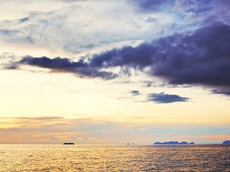 beautiful sunset over calm sea, koh lanta, thailandの写真素材