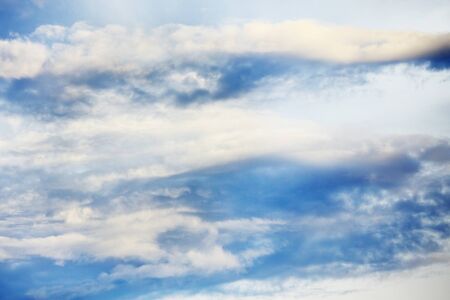 cloudscape with stratocumulus clouds at sunny dayの写真素材