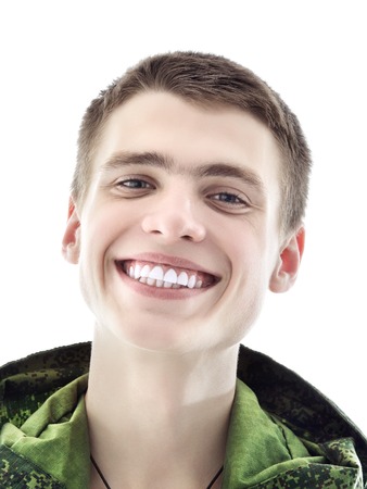 young military man, closeup portrait isolated on whiteの写真素材