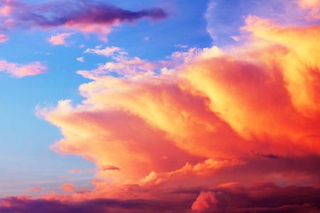 dramatic cloudscape with red sunlight at sunset