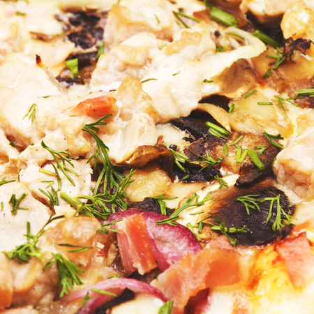 fresh delicious italian pizza with pork, close upの写真素材