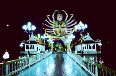 Guanyin Statue at Wat Plai Laem at night, Samui island, Thailandのeditorial素材