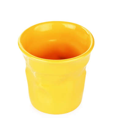 original yellow espresso cup, isolated on whiteの写真素材