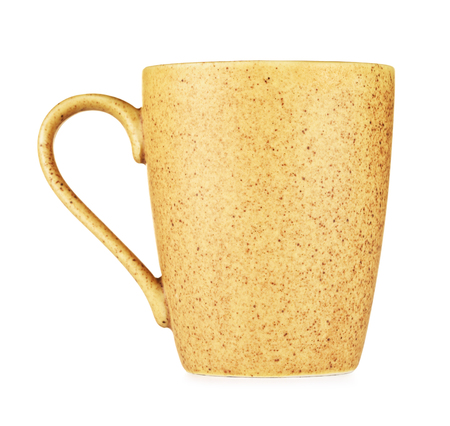 original yellow coffee mug, isolated on white backgroundの写真素材