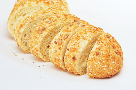 sliced corn bread with sesame and sunflower seedsの写真素材