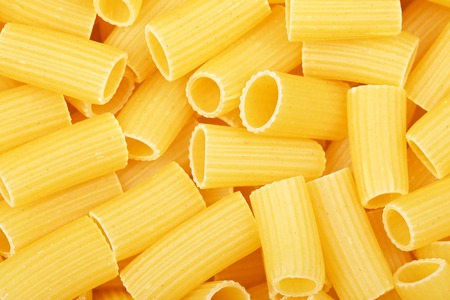 colorful raw pipe pasta background, close upの写真素材