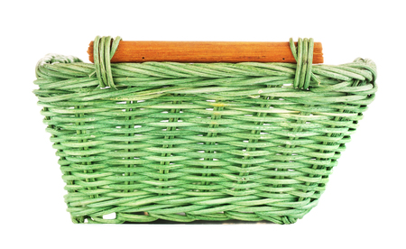 green wooden basket, isolated on white backgroundの写真素材