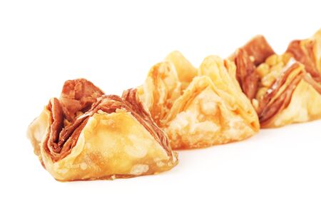 oriental sweets baklava, isolated on white backgroundの写真素材