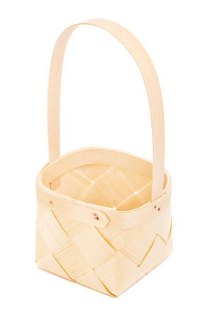 little empty wooden basket, isolated on white backgroundの写真素材