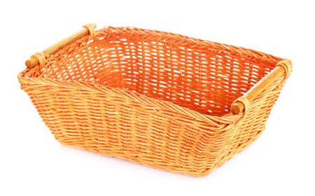 orange wooden basket, isolated on white backgroundの写真素材