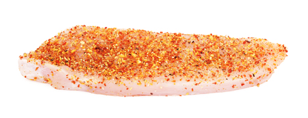 raw turkey meat slice in spices, isolated on whiteの写真素材