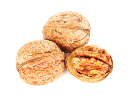 fresh walnuts peeled, isolated on white backgroundの写真素材