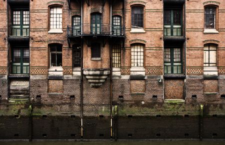 Old warehouse facade in the historic warehouse district of Hamburg, Germany.の写真素材