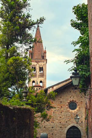 Old brick church in the ancient city of Saluzzo, northern Italyの写真素材