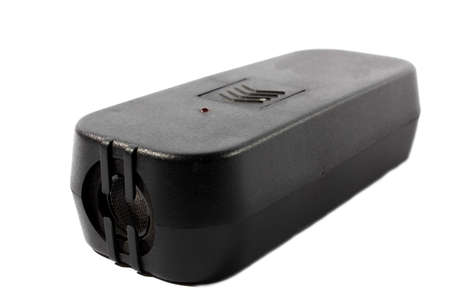Isolated black dog repeller and training aid use to keep aggressive dogs away and getting the...