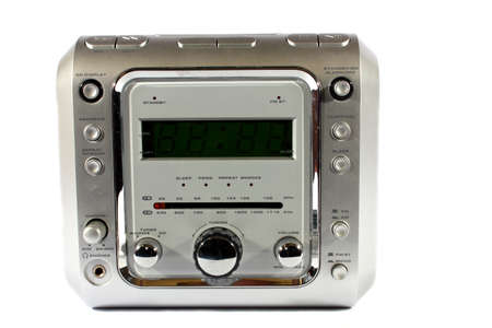 Isolated silver digital alarm clock with radio and CD player の写真素材