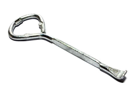 Isolated closeup of a paint can opener  