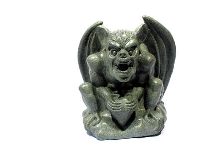 Isolated grey stone gargoyle used for halloween decorationの写真素材