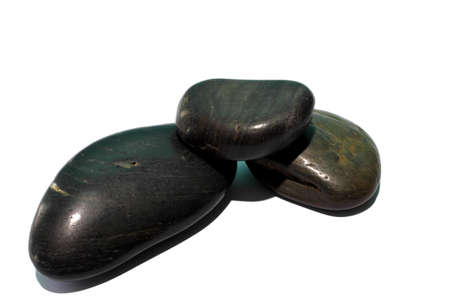 Isolated grey and black river rocks made of stone  の写真素材