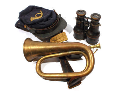 Isolated civil war union hat, bugle, belt, and binoculars  
