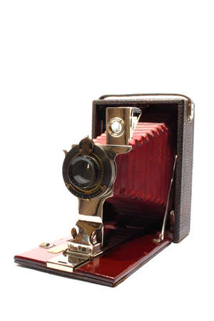Isolated antique camera that slides out from box