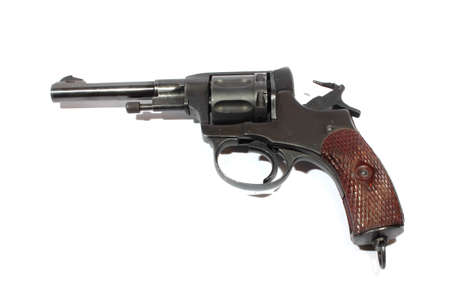 Isolated antique handgun cocked and ready to fire の写真素材