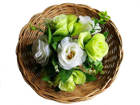 White and green roses in basketの素材