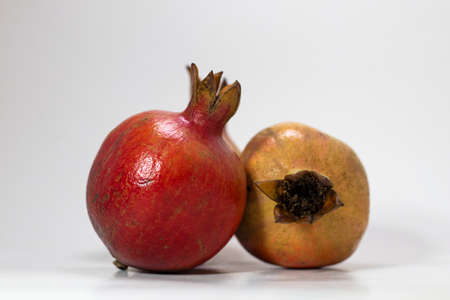 Ripe Pomegranate isolated on white background