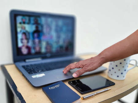 Jaipur,India-Circa 2020:Picture of a laptop and other office related objects kept on a table. Work...