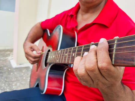 Jaipur,India-Circa 2020: Picture of a guitarist playing guitar