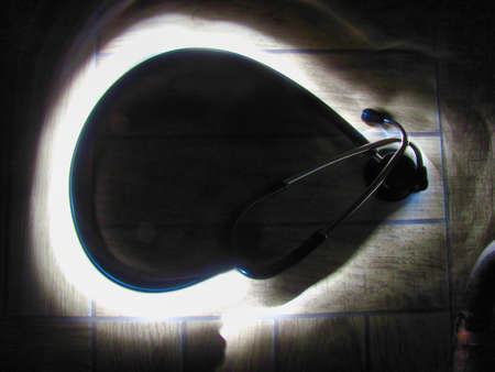 Picture of light streaks around a stethoscope shot at night. Long Exposure photography.の写真素材