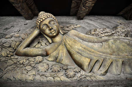 Statue of Buddha in reclining positionの写真素材