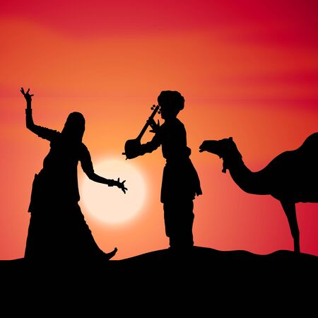 silhouette view of people performing folk dance and music, india  の写真素材