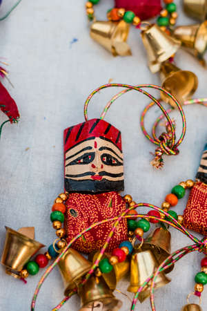 Colorful handmade Rajasthani puppets in display for sale to decorate in Home or shops in New Delhi, India.の写真素材