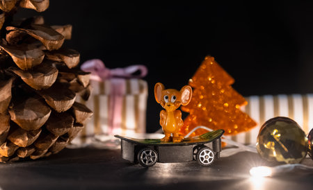 Christmas celebration, Christmas gifts and tree with toys and christmas balls isolated on black background. Christmas theme greetings concept.の写真素材