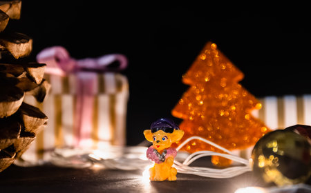 Christmas gifts and tree with toys on blackの写真素材