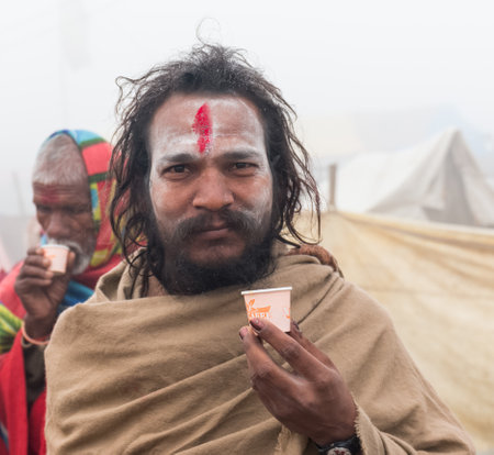 Indian Monk (Naga Sadhu baba) at Holy Ardh Kumbh Mela, Allahabad (Paryagraj), Uttar Pradesh/ India- 16th February 2019. Kumbh Mela happens after 6 year of Maha Kumbh Mela.のeditorial素材