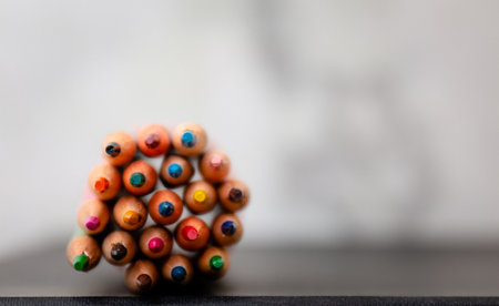 Multi color pencils isolated on black background. Close up shot.の写真素材