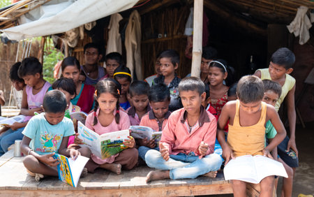 Noida, Uttar Pradesh, India - September 2019 : Poor Students from rural or slum area educated at schools with school bags. spreading happiness on their cute facesのeditorial素材