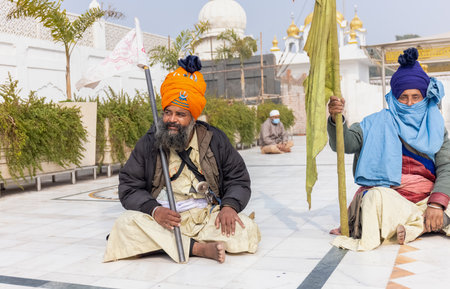 NEW DELHI, INDIA - JANUARY 2021 : Portrait of Sikh man sitting inside the complex of Gurdwara Bangla Sahib. Gurdwara Bangla sahib is pilgrim for sikh people.のeditorial素材