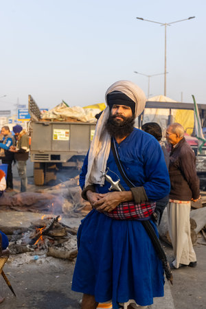 NEW DELHI, INDIA - JANUARY 2021 : Portrait of young Sikh Indian farmers from different states...
