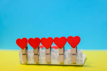 Valentines Day background. Red hearts Love And valentines Day Concept on an isolated colorful Background With Space.の写真素材