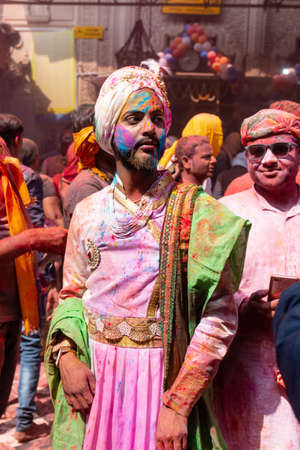 BARSANA, UTTAR PRADESH, INDIA - MARCH 2020 : Unidentified people from Nandgaon visits Barsana to play colorful Holi with the Women of Barsana as ritual of Lathmar holi every year.のeditorial素材