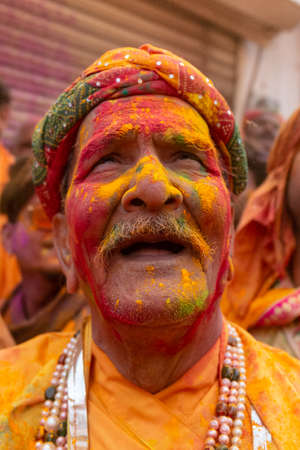 BARSANA, UTTAR PRADESH, INDIA - MARCH 2020 : Unidentified people from Nandgaon visits Barsana to play colorful Holi with the Women of Barsana as ritual of Lathmar holi every year.のeditorial素材