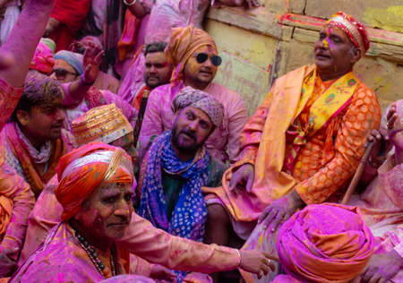BARSANA, UTTAR PRADESH, INDIA - MARCH 2020 : Unidentified people from Nandgaon visits Barsana to play colorful Holi with the Women of Barsana as ritual of Lathmar holi every year.のeditorial素材