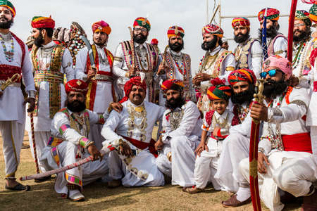 Bikaner, Rajasthan, India - January 2019 : Portrait of Rajput male  from bikaner city with big mustache, beard and colorful turban in traditional attire and necklace participating in camel festival.のeditorial素材