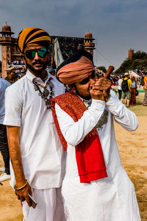 Bikaner, Rajasthan, India - January 2019 : Portrait of Rajput male  from bikaner city with big mustache, beard and colorful turban in traditional attire and necklace participating in camel festival.のeditorial素材