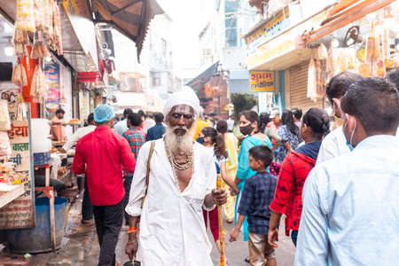 VRINDAVAN, UTTAR PRADESH, INDIA - AUGUST 2021: Krishna Janmashtami, Portrait of Indian people in vrindavan to get worship of lord krishna.のeditorial素材