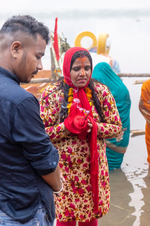 Ghaziabad, Uttar Pradesh, India - November 2021: Chhath Puja, Indian hindu devotees performing...