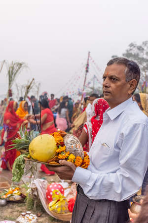 Ghaziabad, Uttar Pradesh, India - November 2021: Chhath Puja, Indian hindu devotees performing...